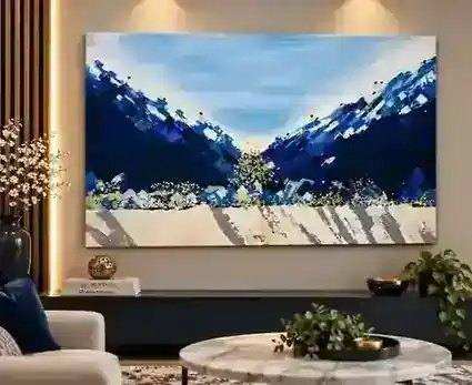 Blue Mountain painting displayed in a matching blue, neutral and warm modern interior