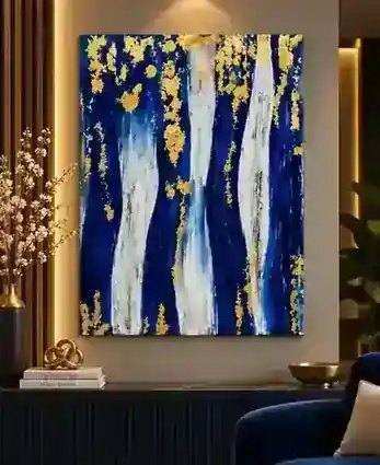 Midnight Gold painting displayed in a matching blue, white and gold modern interior